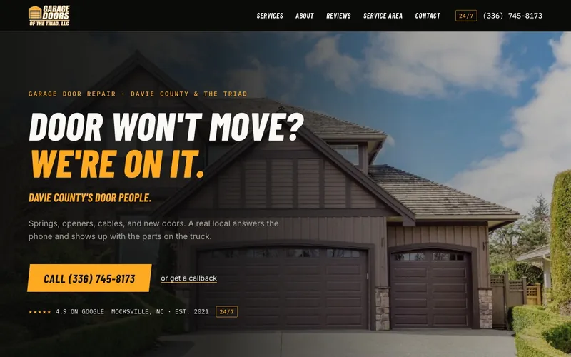 The Garage Doors of the Triad website we built, home page on a desktop screen